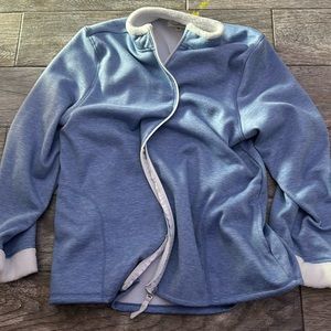 Zip up jacket with pockets.